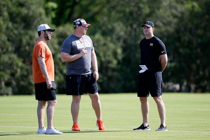 Brian Callahan, Doug Rosfeld and Zac Taylor stand together